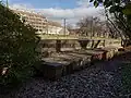 The retaining wall by the Ördög-árok stream buried in a recess