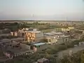 Housing on the outskirts of As Saqlāwīyah