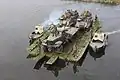 KrAZ-255 ferrying on its own PMP pontoon-bridge, Ukraine