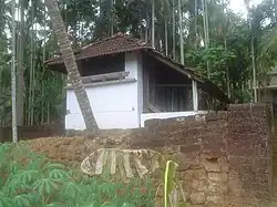 Poocholamadu Cheroor Srambia in Vengara is built on a pond