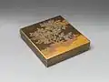 Edo period 18th-century suzuri-bako depicting a warbler in a plum tree, made in lacquered wood with gold and silver inlay