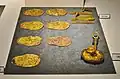 Dragon pattern ornament, heart leaf-shaped mirror plate bit, obi end fitting, excavated from Fujinoki Tomb