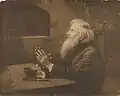 Man praying over meal