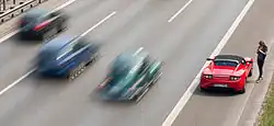Image 27Vehicles experiencing a breakdown or an emergency can stop in the emergency lane; these lanes may themselves present risks to traffic. (from Road safety)