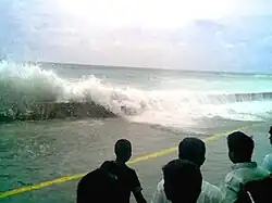 Image 31The tsunami that struck Malé on 26 December 2004; photo taken by Sofwathulla Mohamed while standing on his doorstep; his apartment was entirely washed out, damaging all his belongings (from History of the Maldives)