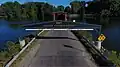 Aerial photo taken from drone of sign protecting bridge from oversize vehicles
