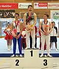Senior podium at the 2022 all-around victory ceremony