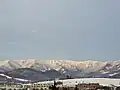 A view of the transmitter mast from a distance over 11 km (7 miles)