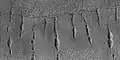 Close view of lines of pits, as seen by HiRISE under HiWish program