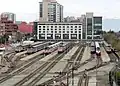 View of an urban railroad terminal station with six island platforms
