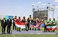Compound men medal ceremony