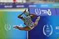 Rolling the ball between the hands during a split leap (Aibota Yertaikyzy)