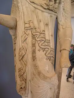 Traces of paint depicting embroidered patterns on the peplos of an Archaic Kore, c. 530 BC marble, Acropolis Museum, Athens, Greece