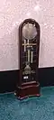 An old grandfather clock in the main prayer hall. The name of the donor of said clock, Haji Rahim bin Baba, is imprinted on the glass, and the donaton of said clock is also dated to 1987 (1408 in the Islamic calendar)