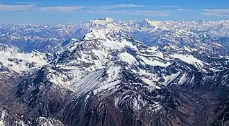 Mountain tops, with clouds shown.