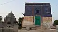 Shah Ali Akbar's tomb (left) is adjacent to that of his mother's (right)