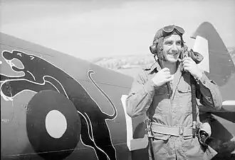 152 Squadron pilot and Spitfire in Burma during WWII, showing the distinctive leaping black panther emblem