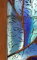 Small face, possibly Chagall's, in Window 4