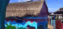 Colorful renovation of the huts of the accommodation site ("Mille Logements") intended to accommodate the homeless after the Brazzaville arms dump blasts in 2012.