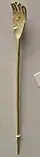 Gold pin with terminus in the shape of a small hand