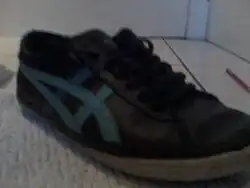 An Aspics sports shoe