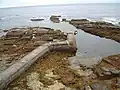 Auckengill Jetty with man made dock.