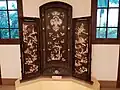 Vietnamese folding screen decorated using the khảm xà cừ technique.