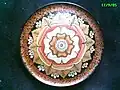 The Pasto Lacquer is a decorative handicraft of precolumbian origin, that uses a type of natural rubber (the resin of the Mopa-mopa tree, Elavagia pastoensis Mora) which is colored and then stretched over woodwork pieces.
