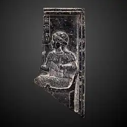 Fragment of a bas-relief with goddess Ninsun; 2255–2040 BC; steatite; height: 14&nbsp;cm; Louvre