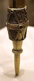 Lower knop and ferrule with loose ring and tapering spike
