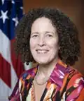 Headshot of Bea Hanson, former Acting Director and Principal Deputy Director of the OVW, 2011–2017.[15]