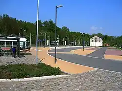 The forecourt of the station on the narrow-gauge side with the recognisable coal shed in the background