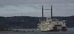 Showboat Branson Belle on Table Rock Lake in Branson, Missouri, is a sternwheeler showboat. It is run aground in this picture.