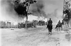 German soldiers beside a Russian village they destroyed during Operation Barbarossa, 16 July 1941