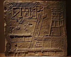 Pictorial brick depicting a typical Han-style palatial courtyard with watchtowers.