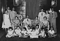 Hoesein's 70th birthday, surrounded by his wife, children, and grandchildren.