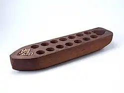 Image 29Sungka, a traditional Filipino game. (from Culture of the Philippines)