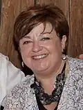 Tari Moore smiling in 2016