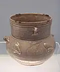 Celadon jar with brown spots, Eastern Jin, 317–420 CE.