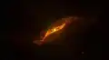 The heavily obscured inner (barred?) spiral disk at 24 μm as shown by the Spitzer IR telescope