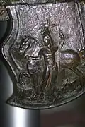 Fragment of parade helmet earmuff, 1st century AD, bronze; from Ostrov[8]