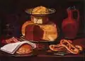 Still life with a similar position of the dish, the butter curls on top of the cheese