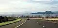M8 nearing the west terminus of the motorway at Langbank, with views over the Clyde