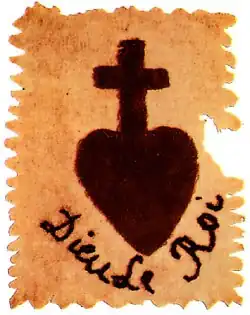 A red cross supported by a heart