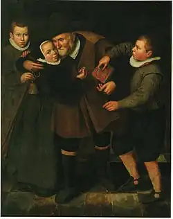 Old man accepting alms