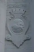 Crest of the Singapore Municipal Commission on a gatepost of the former Bidadari Cemetery
