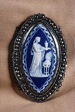Belt clasp designed by Lady Templeton and Emma Crewe for Josiah Wedgwood's factory. Jasperware, steel, tin. The Walters Art Museum