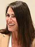 Danielle Hornberger facing left smiling in 2023