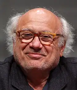 A smiling Danny DeVito