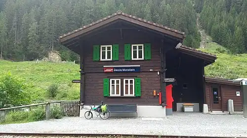 Two-story building with gabled roof